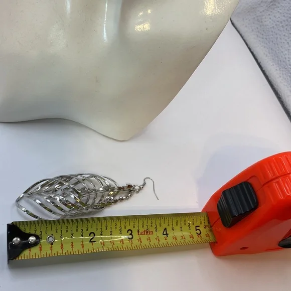 Stunning multi layered silver tone earrings faux diamond center. - Picture 3 of 3